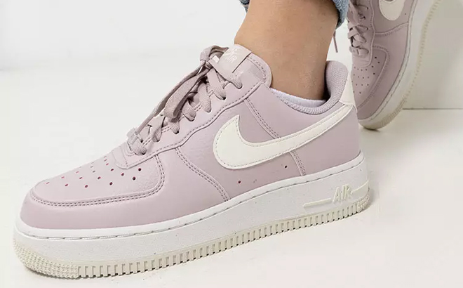 A Woman Wearing Nike Air Force 1 '07 Low SE Next Nature Sneakers