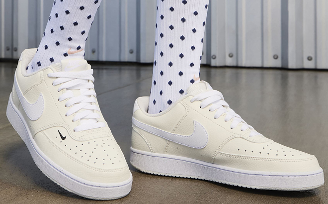 A Woman Wearing Nike Court Vision Low Next Nature Shoes