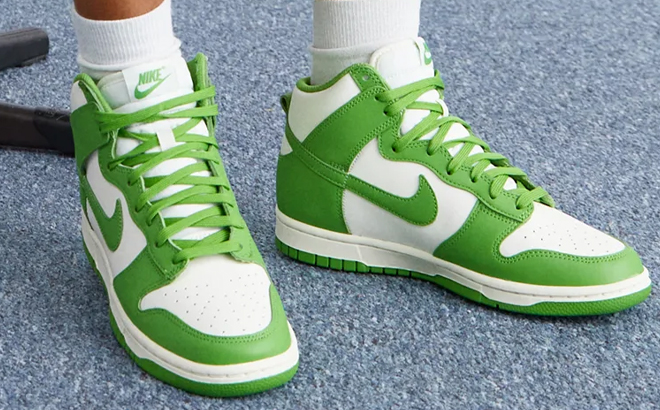 A Woman Wearing Nike Dunk High Retro Shoes