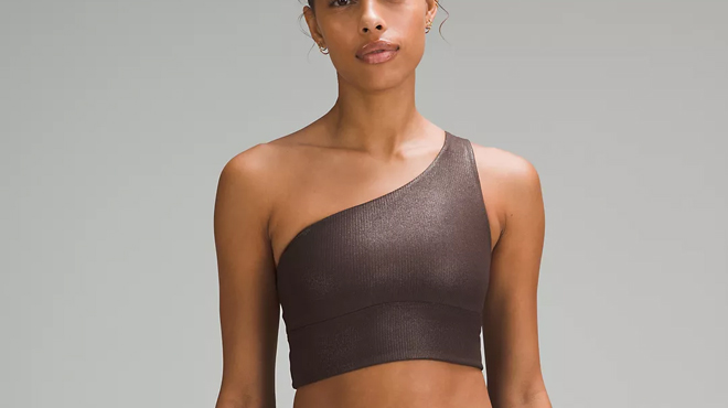 A person wearing a Lululemon Asymmetrical Ribbed Bra