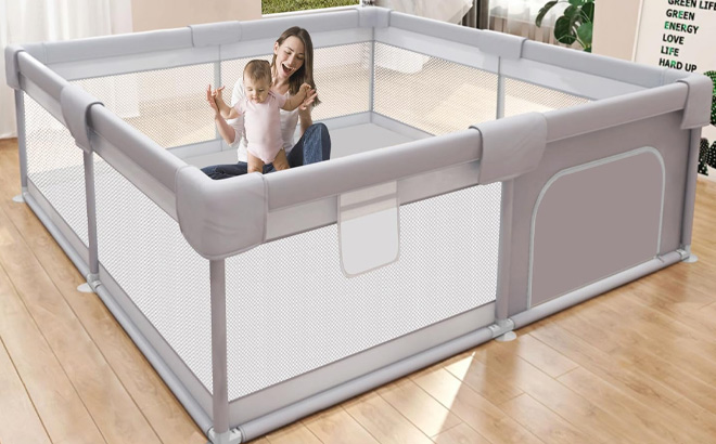 Mom and Baby Playing in Baby Playpen