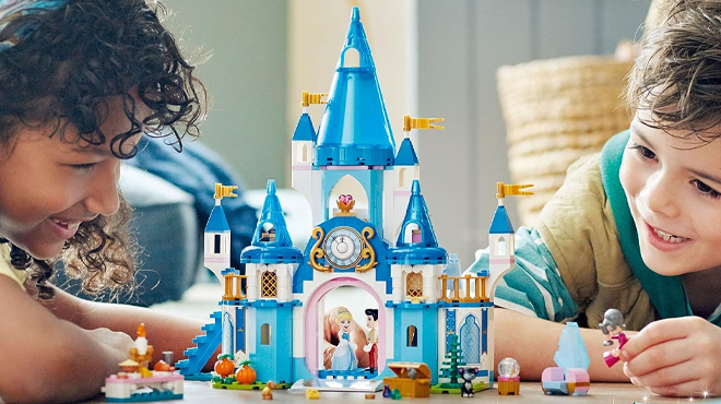 People playing with LEGO Disney Princess Cinderella and Prince Charmings Castle Set