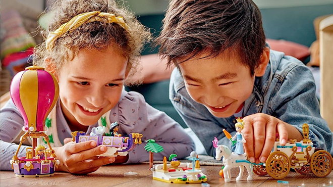 People playing with LEGO Disney Princess Enchanted Journey Building Set