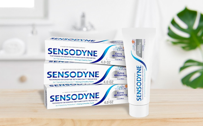 Sensodyne Extra Whitening Sensitive Teeth 3 Pack on a Table