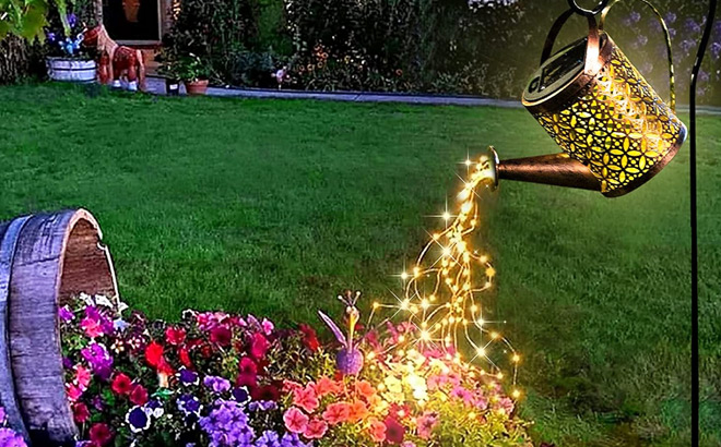 Solar Watering Can with Lights in the Garden