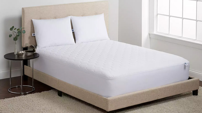 The Big One Waterproof Mattress Pad on a Bed
