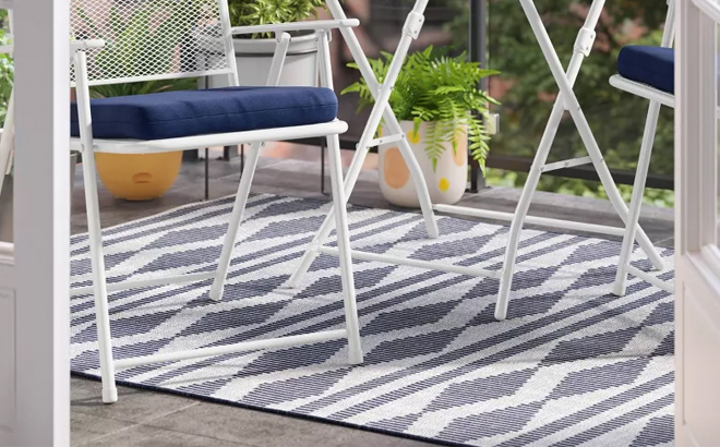 Threshold 5x7 Tapestry Geo Outdoor Rug on a Patio