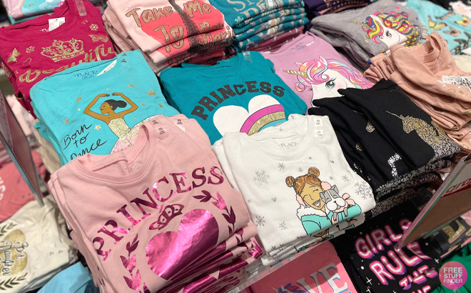 Various The Childrens Place Graphic Tees on a Shelf