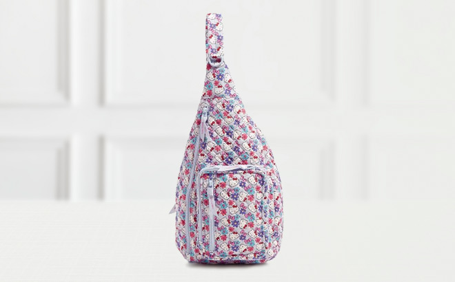 Vera Bradley x Hello Kitty Sling Backpack on the Table