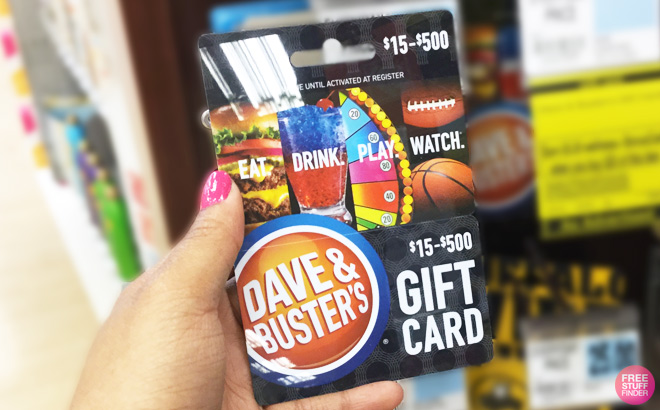 a Person Holding Dave Busters Gift Card