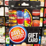a Person Holding Dave and Busters Gift Card