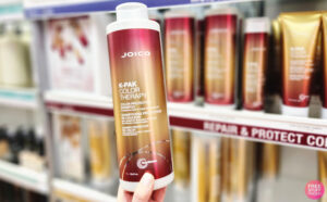 a Person Holding Joico Shampoo