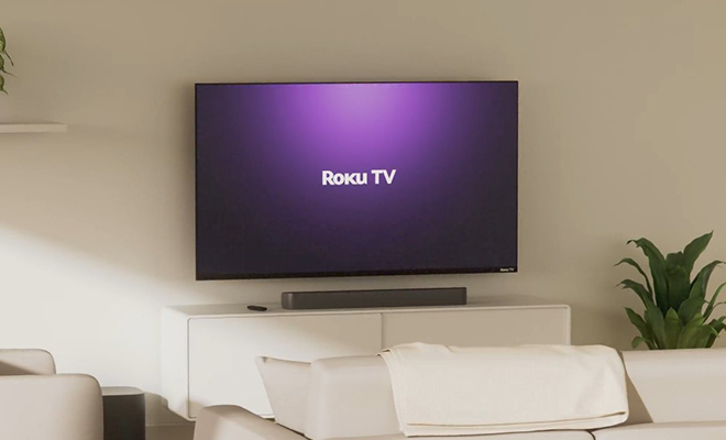 onn 65 Inch 4K UHD Smart Roku TV in a Living Room