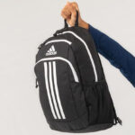 A Boy Holding the Adidas Creator 2 Backpack