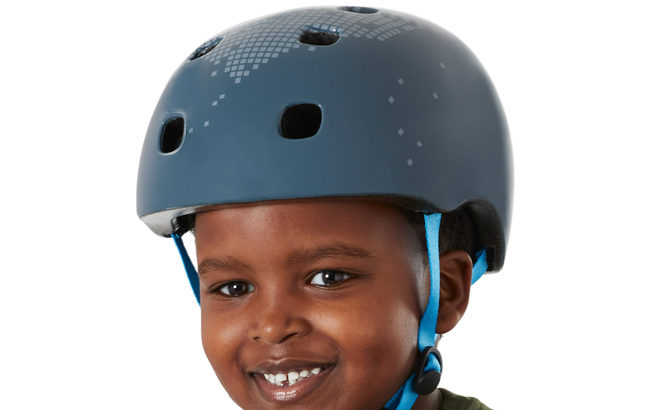 A Child Wearing Schwinn Burst Youth Multisport Helmet