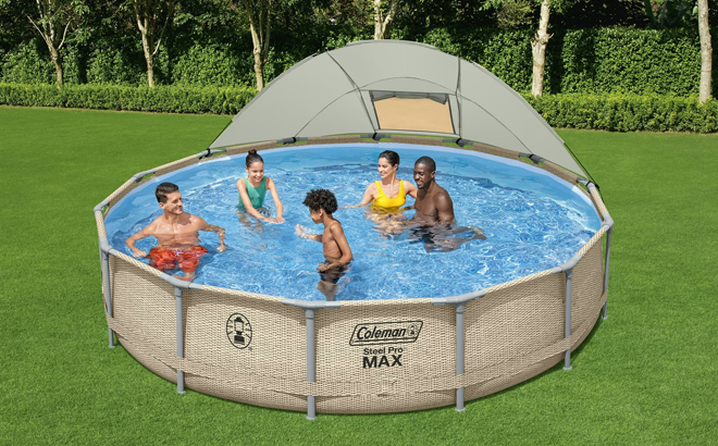 A Family in a Coleman Round Metal Frame Above Ground Pool