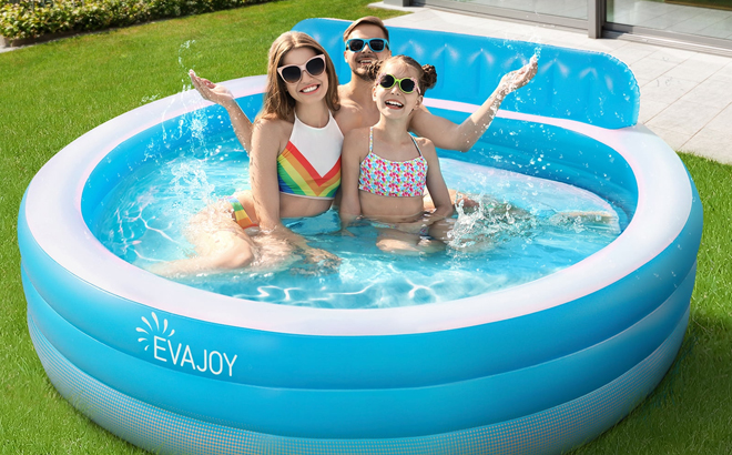 A Family in a Sable Inflatable Family Swimming Pool with Seat