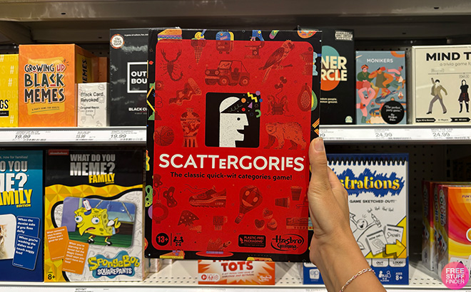 A Hand Holding Scattergories Board Game