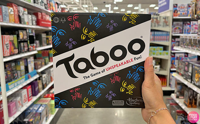 A Hand Holding Taboo Board Game