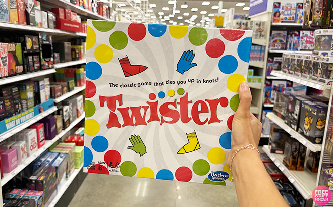 A Hand Hollding Twister Board Game