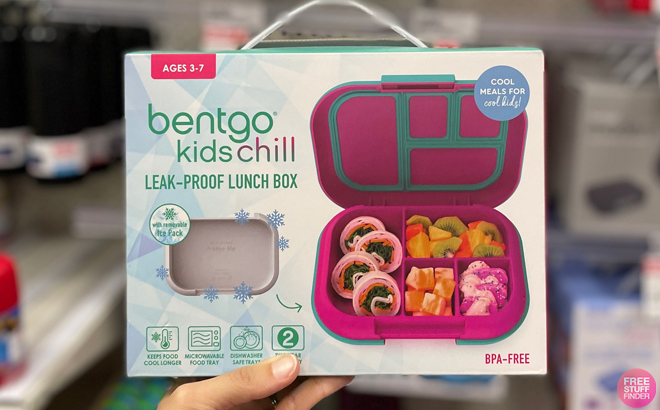 A Hand holding Bentgo Kids Chill Lunch Box