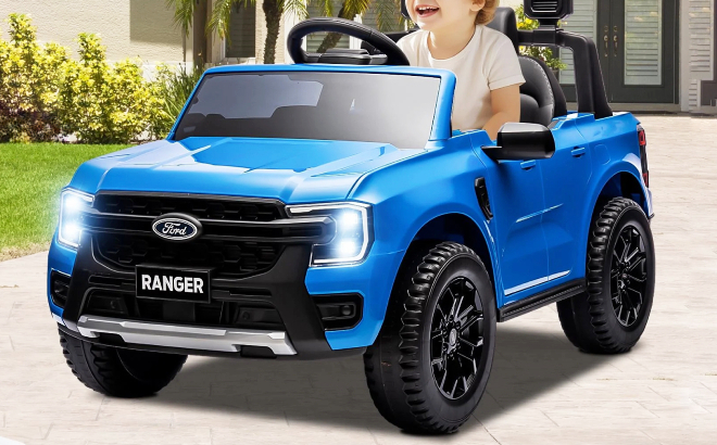 A Kid Playing with Ford Ranger Ride on Car