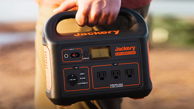 A Person Carrying Jackery Explorer 1000 Portable Power Station