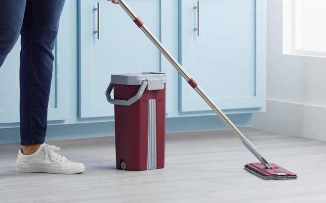 A Person Cleanind using Microfiber HandiMop Bucket