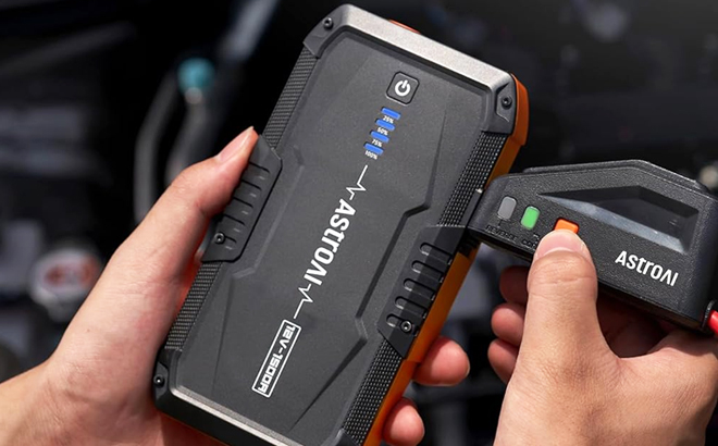 A Person Holding AstroAI S8 Car Battery Jump Starter