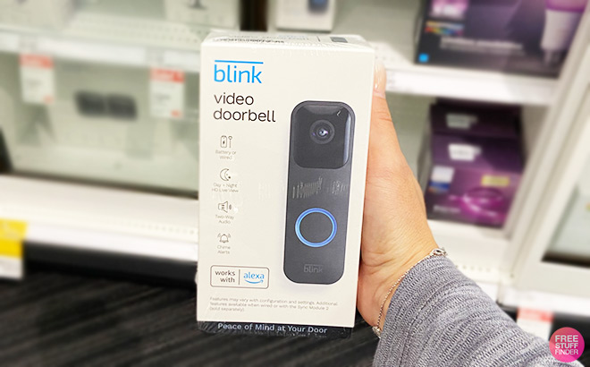 A Person Holding Blink Wi Fi Video Doorbell