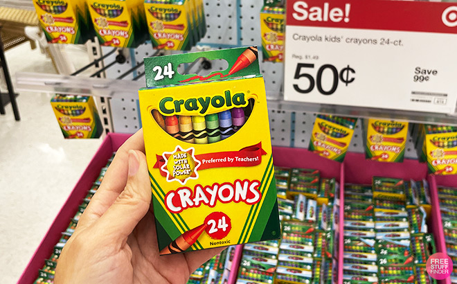 A Person Holding Crayola Crayons