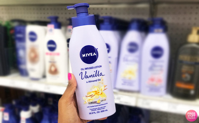 A Person Holding Nivea Oil Infused Vanilla and Almond Oil Body Lotion