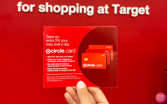 A Person Holding Target Circle Card