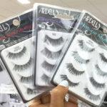 A Person Holding Three Ardell Multipack False Lashes