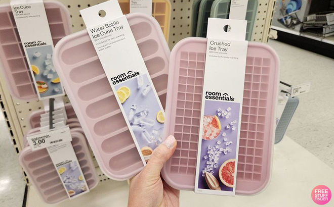 A Person Holding Two Room Essentials Ice Trays at Target