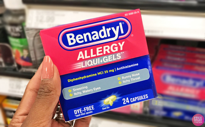 A Person Holding a Box of Benadryl Allergy Capsules