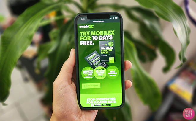 A Person Holding a Phone with MobileX on the Background