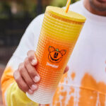 A Person Holding a Starbucks Halloween Disney Mickey Mouse Tumbler