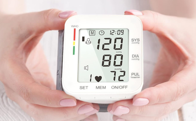 A Person Holding a Wrist Blood Pressure Monitor