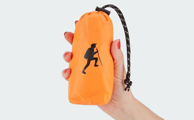 A Person Holding the Hikeback Lightweight Packable Backpack 24L