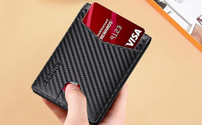 A Person Holding the Mens Slim Rfid Leather Wallet