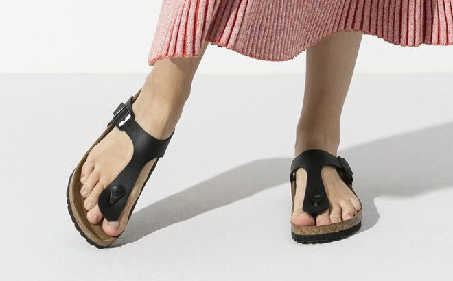 A Person Wearing Birkenstock Gizeh Birko Flor Sandals