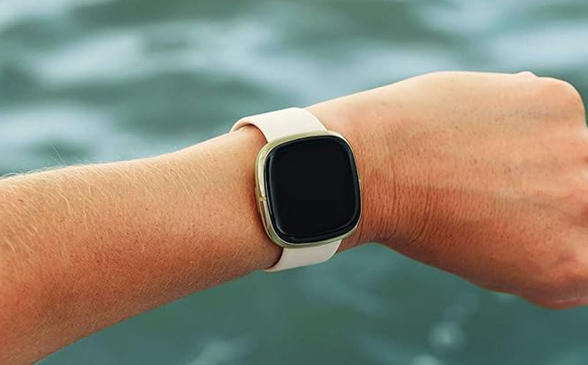 A Person Wearing Fitbit Sense Advanced Smartwatch