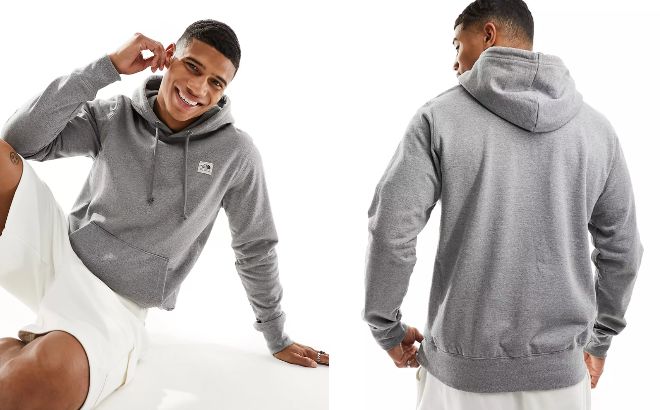 A Person Wearing The North Face Heritage Patch Hoodie