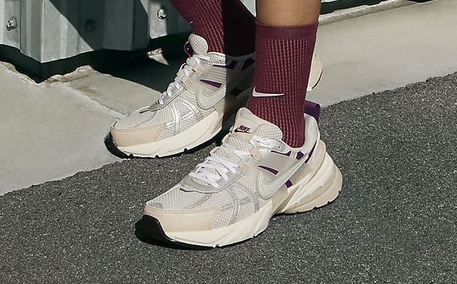 A Person Wearing the Nike V2K Run Premium Womens Shoes