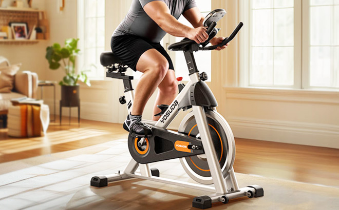 A Person Working Out at Home on a Yosuda Exercise Bike