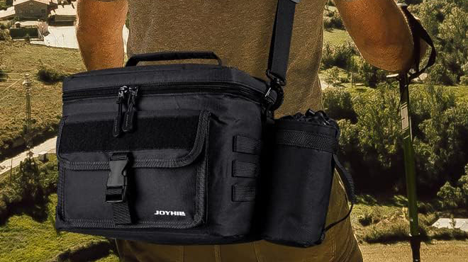 A Person carrying a Joyhill Tactical Lunch Box 