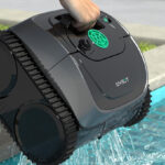 A Person holding Robotic Pool Cleaner