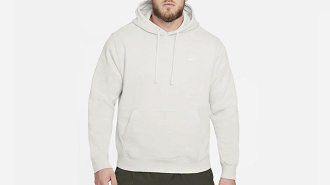 A Person wearing Nike Sportswear Club Fleece Pullover Hoodie 