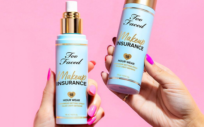 A Woman Holding Too Faced Makeup Insurance Setting Sprays